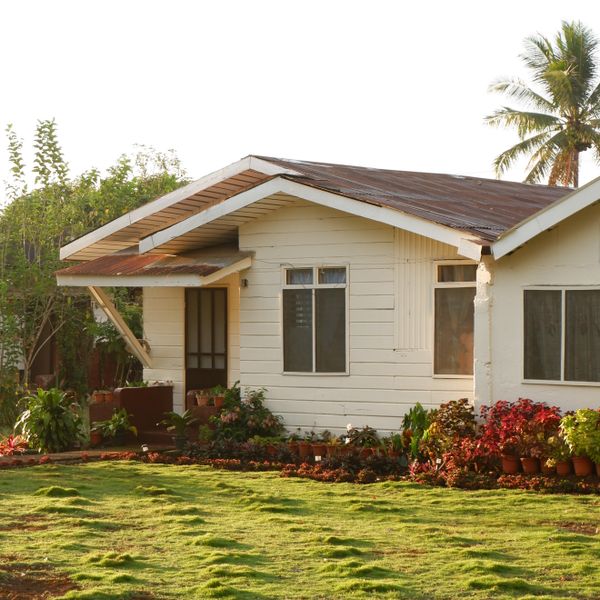House with a landscaped tropical garden in Valencia City, Philippines