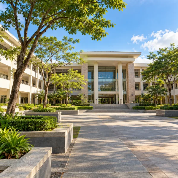 Philippine college campus building and landscaped walkway